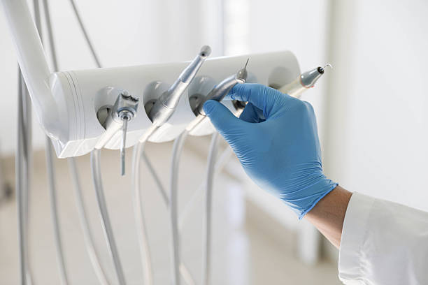 Professional Tooth Extraction technician working in Faulkner County County, AR